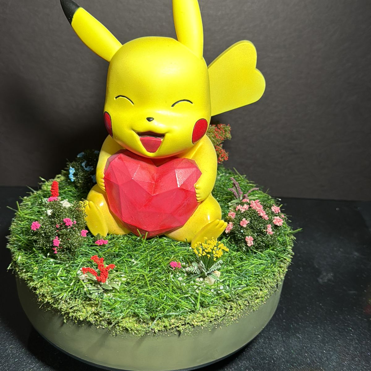 Custom Pikachu 3D figure with heart and grass diorama