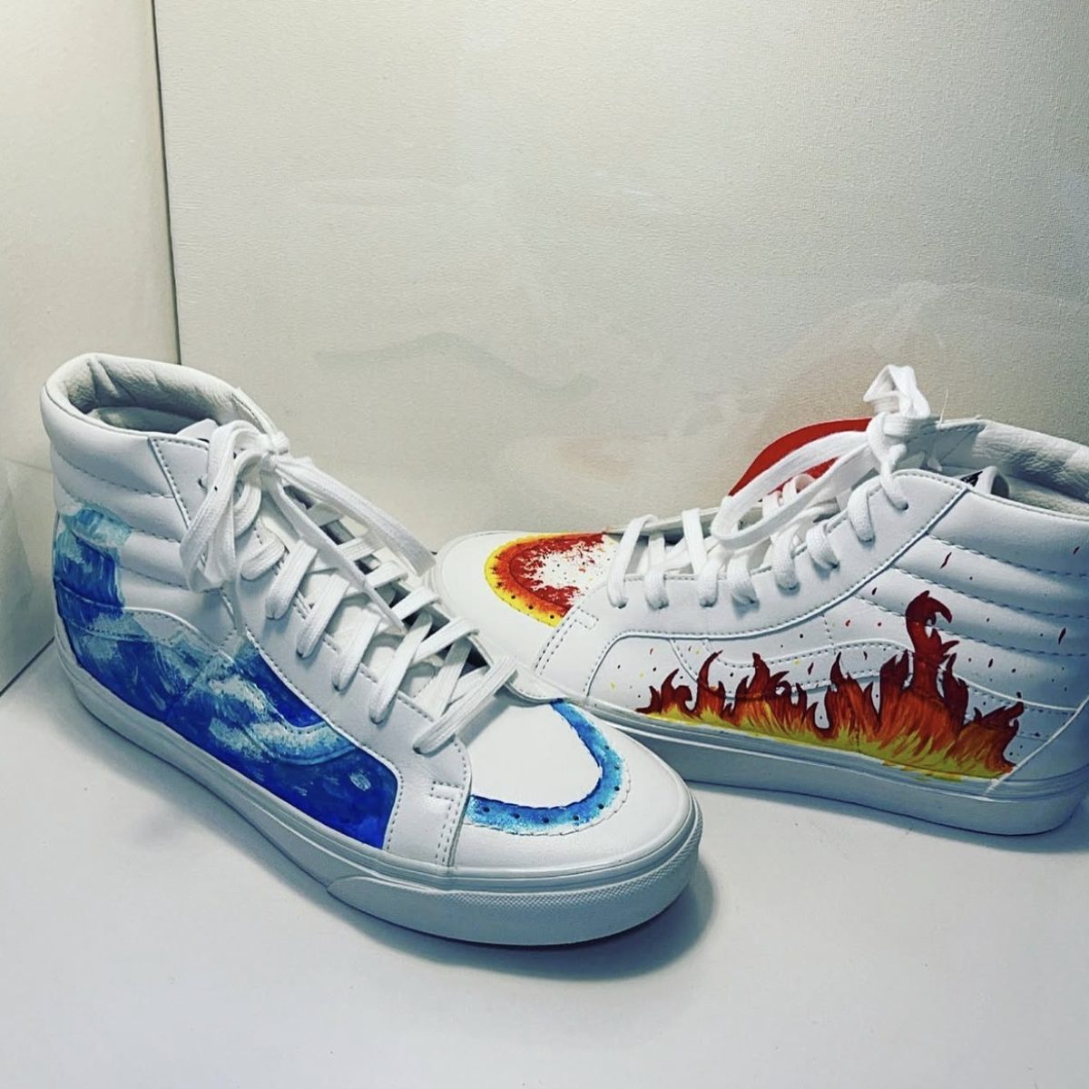 Hand-painted Vans sneakers with fire and water theme